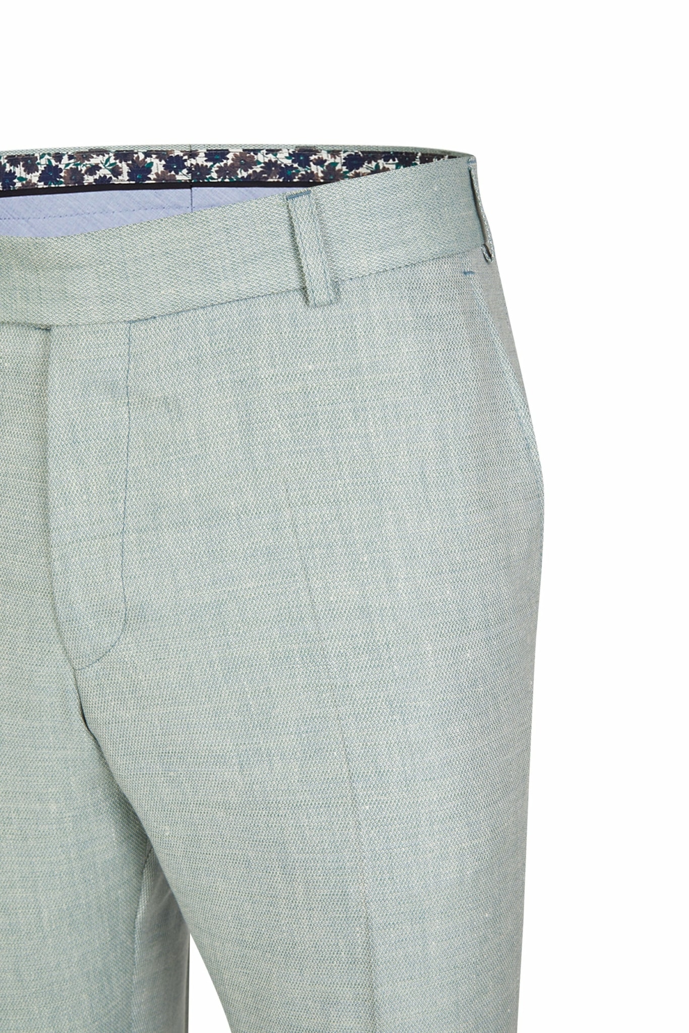 Nahaufnahme der Wilvorst Green Wedding Hose 411206/40 in Hellgrau mit Seitentasche und floral gemustertem Innenbund, abgebildet auf weißem Hintergrund - ideal zum Kombinieren mit Brautmoden oder dem Brautkleid Ihrer Wahl.